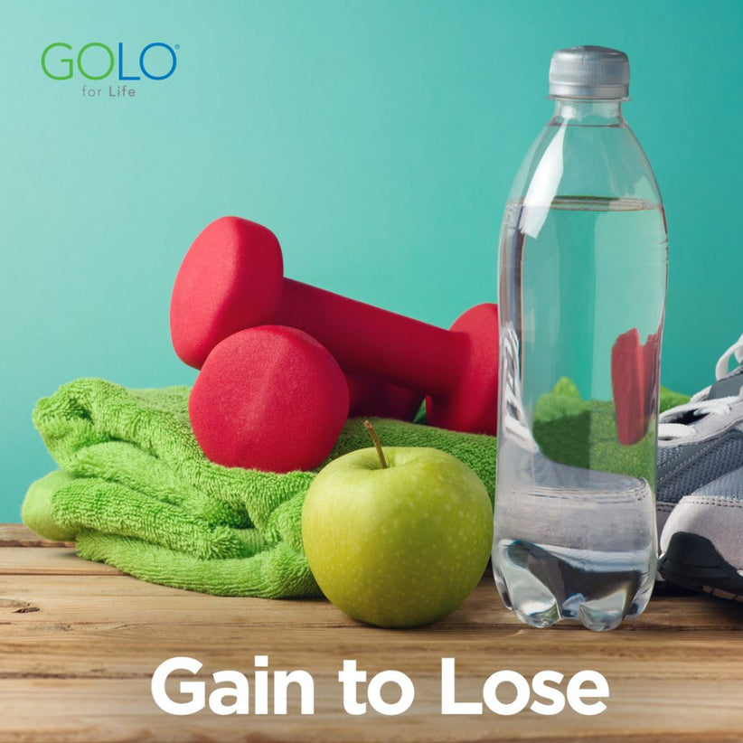 exercise gear with apple and water bottle